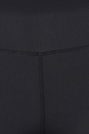 Product shot of the Elements Luxe Rib Pant in colour Black (Black), detail