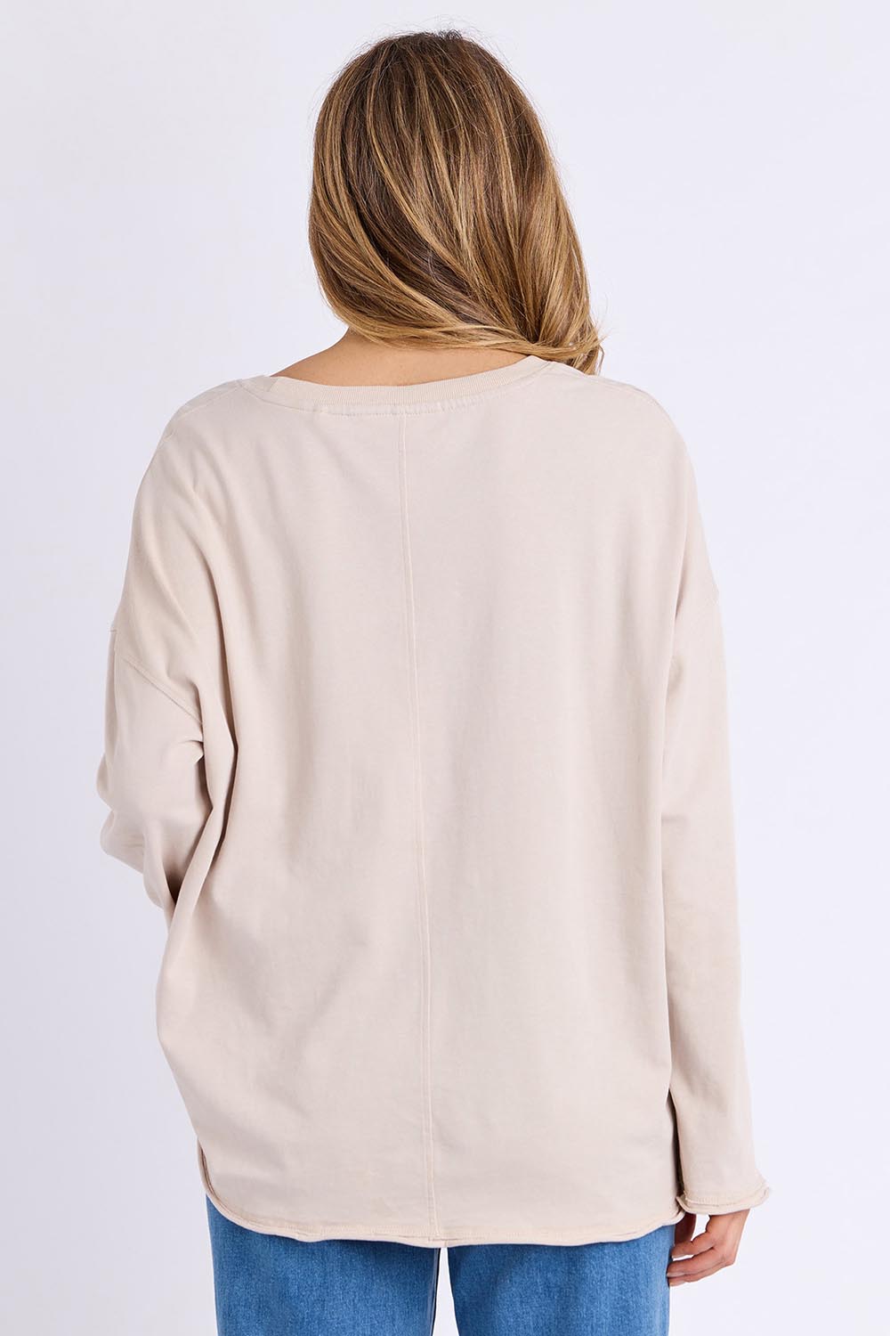 Model Genericm wearing size sample of the Bandit Boots Long Sleeve Tee – Oat in colour Oat, from the back