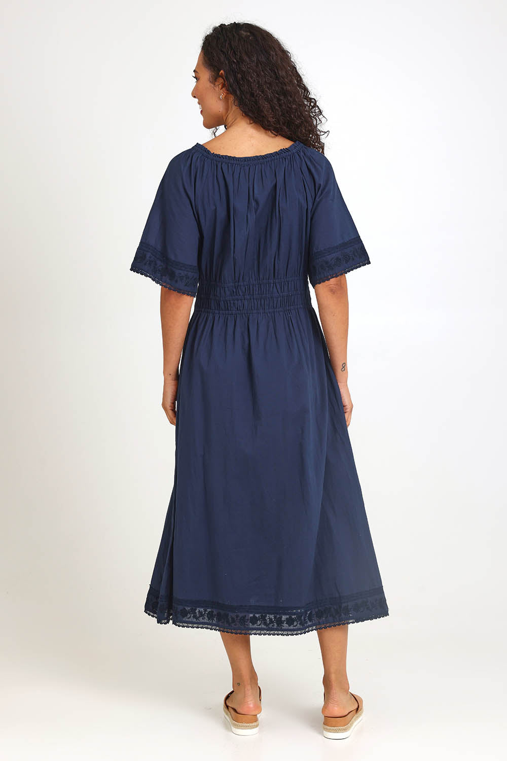 Model Pamelar wearing size 10 of the Juna Cotton Dress – Dsapphire in colour Dsapphire, from the front