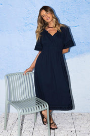 Model Genericm wearing size sample of the Juna Cotton Dress – Dsapphire in colour Dsapphire, from the front