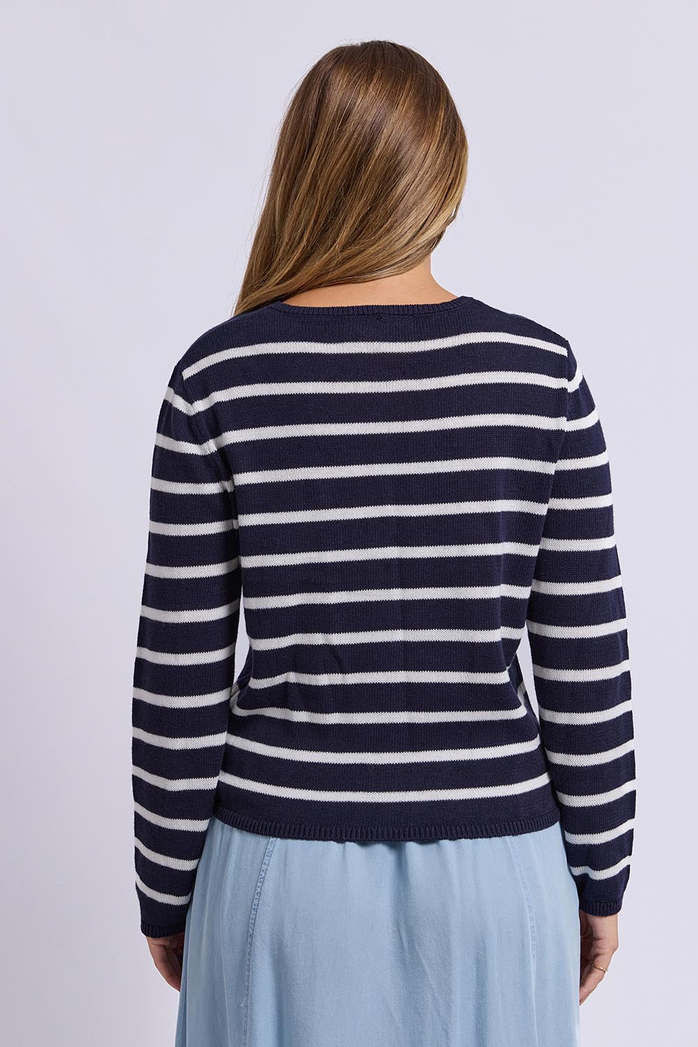 Model Genericm wearing size sample of the Eden Stripe Cardi – Dsapphire in colour Dsapphire, from the back