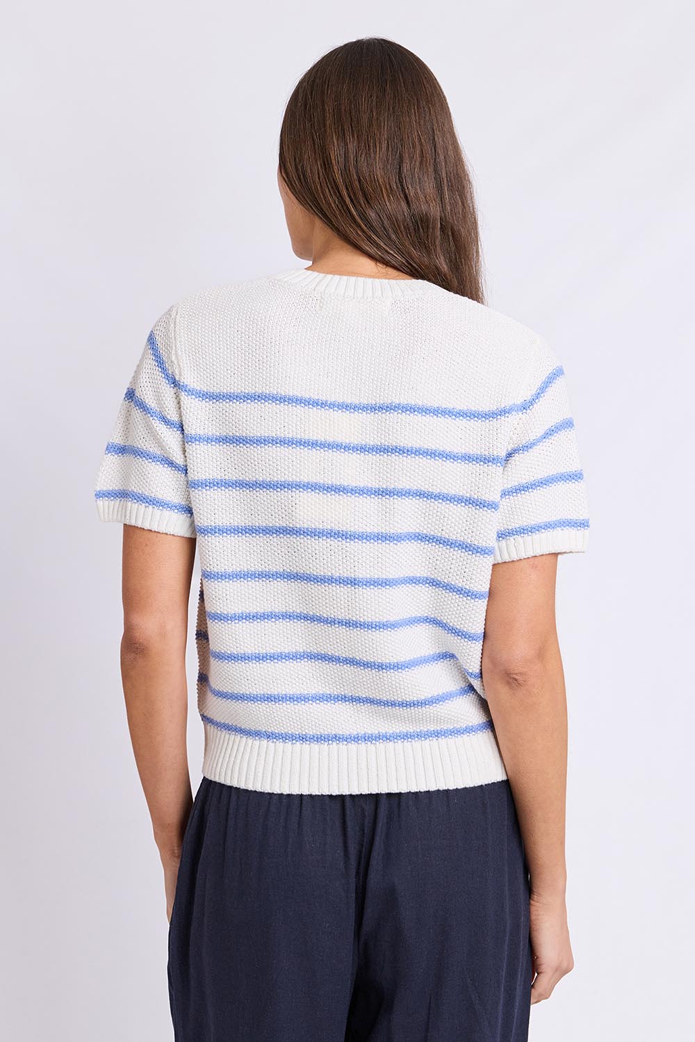 Model Genericm wearing size sample of the Blair Stripe Short Sleeve Knit – Whitestrip in colour Whitestrip, from the back