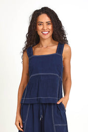 Model Pamelar wearing size 10 of the Sage Top – Dsapphire in colour Dsapphire, in a cropped view