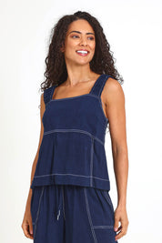 Model Pamelar wearing size 10 of the Sage Top – Dsapphire in colour Dsapphire, in a cropped view