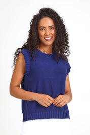Model Pamelar wearing size 10 of the Vesper Knit – Deepblue in colour Deepblue, in a cropped view