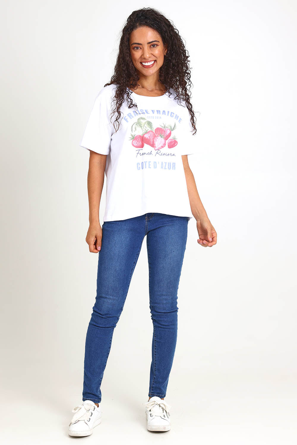 Model Pamelar wearing size 10 of the Fraiche Tee – White in colour White, from the front