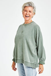 Model Elise wearing size 10 of the Everyday Crew in colour Greenmist (Green), from the front, cropped image