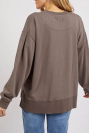 A model wearing the Everyday Crew in colour StoneGrey (Grey), from the back