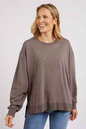 A model wearing the Everyday Crew in colour StoneGrey (Grey), from the front, cropped image