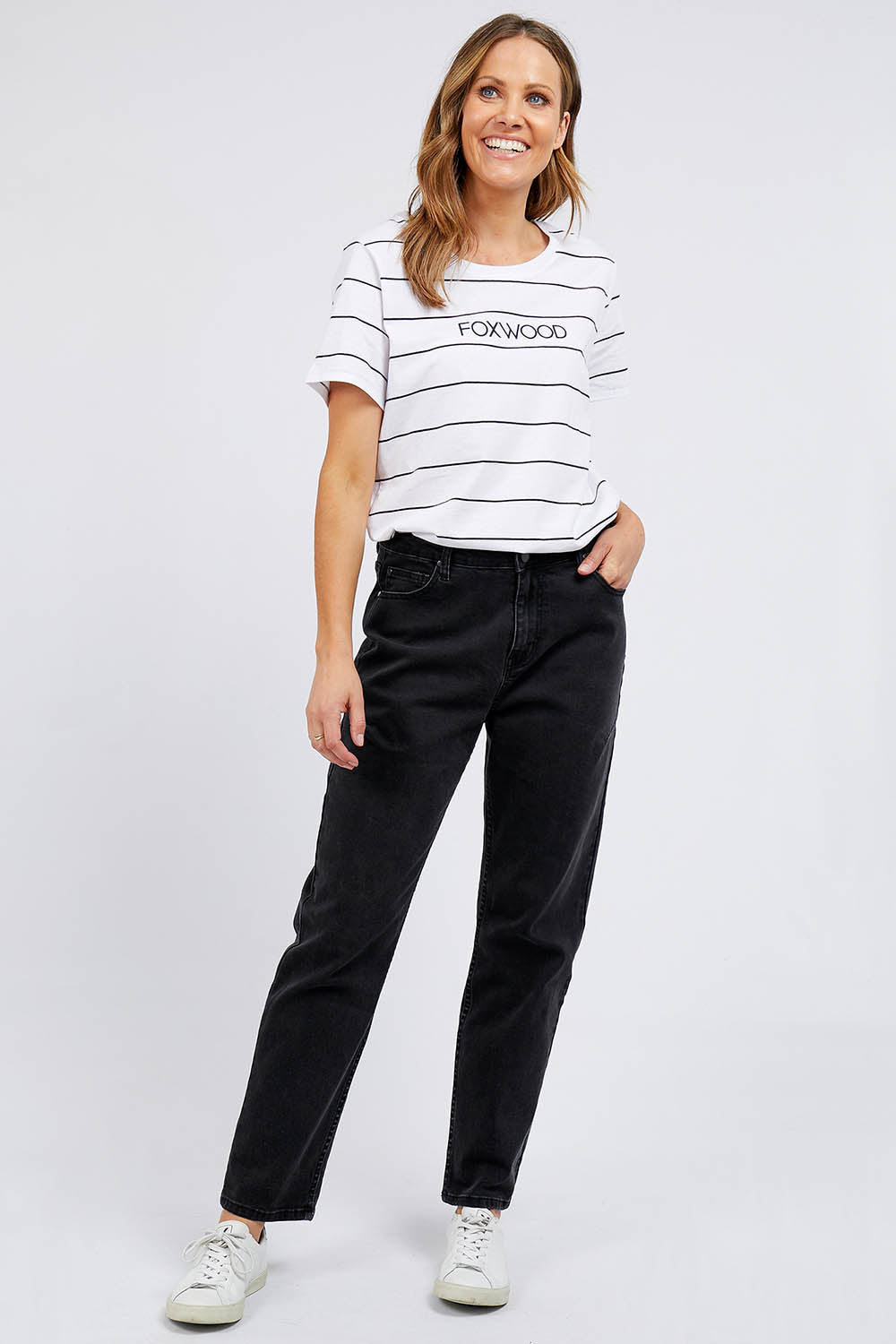 A model wearing the Barkley Straght Leg in colour Black (Black), from the front, showing the whole outfit