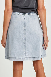 Model Madeline wearing size 10 of the Amanda Skirt in colour Lightblue (Blue), from the back