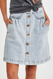 Model Madeline wearing size 10 of the Amanda Skirt in colour Lightblue (Blue), from the front, cropped image