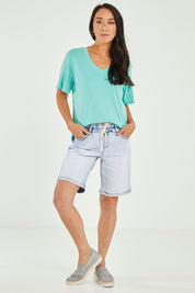Model Katie wearing size 10 of the Gabby Bermuda in colour Lghtblue (Blue), from the front, showing the whole outfit