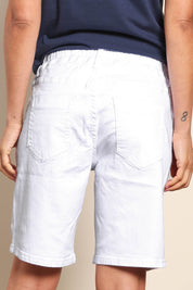Model Pamelar wearing size 10 of the Gabby Bermuda - White in colour White, from the back