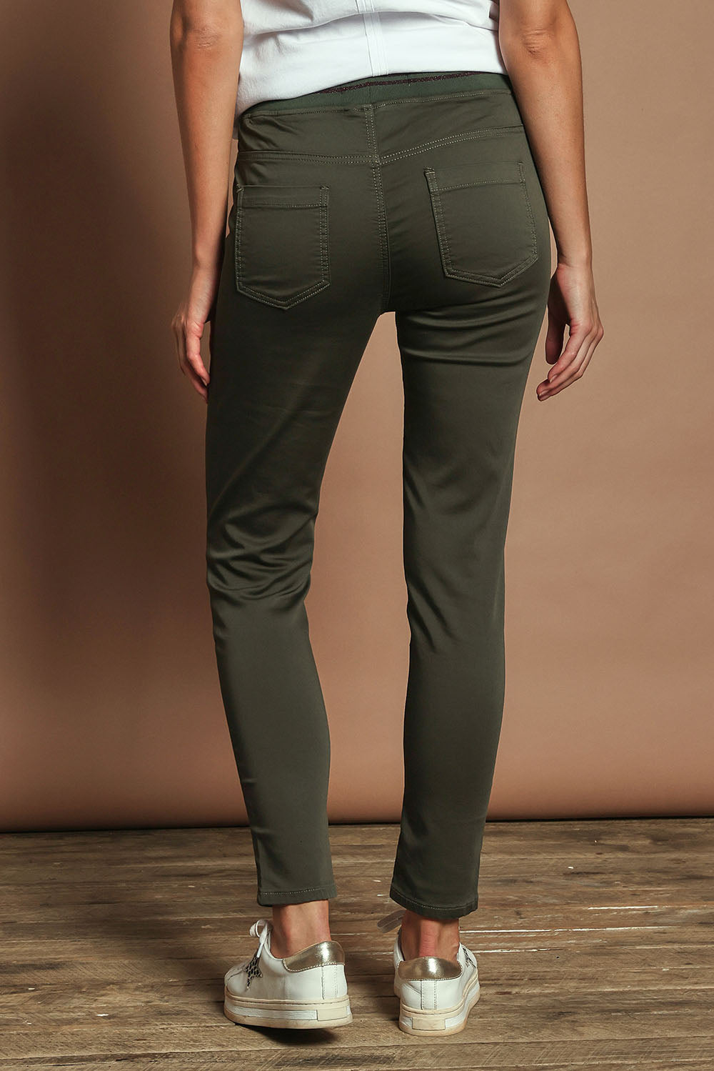 Model Madeline wearing size 10 of the Elements Sylvia Jogger in colour Darkkhaki (Green), from the back