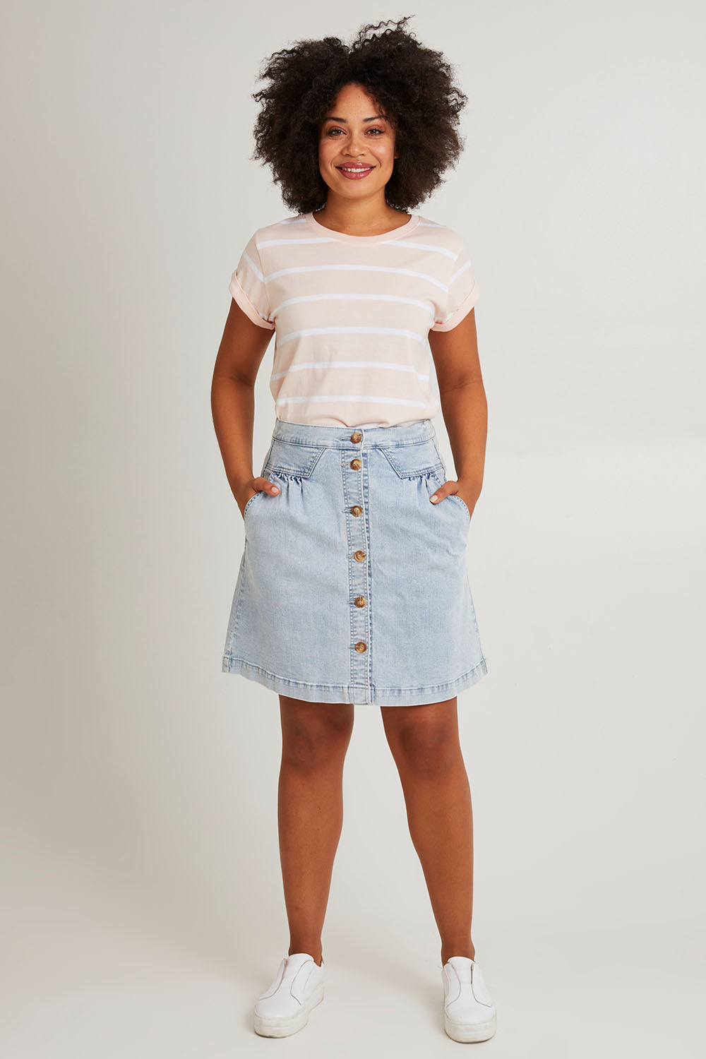 Model Olivia wearing size 10 of the Elements Amanda Skirt in colour Vintage (Blue), from the front, showing the whole outfit