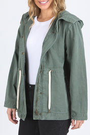 A model wearing the Elements Kingston Cotton Anorak in colour Khaki (Green), from the front, cropped image