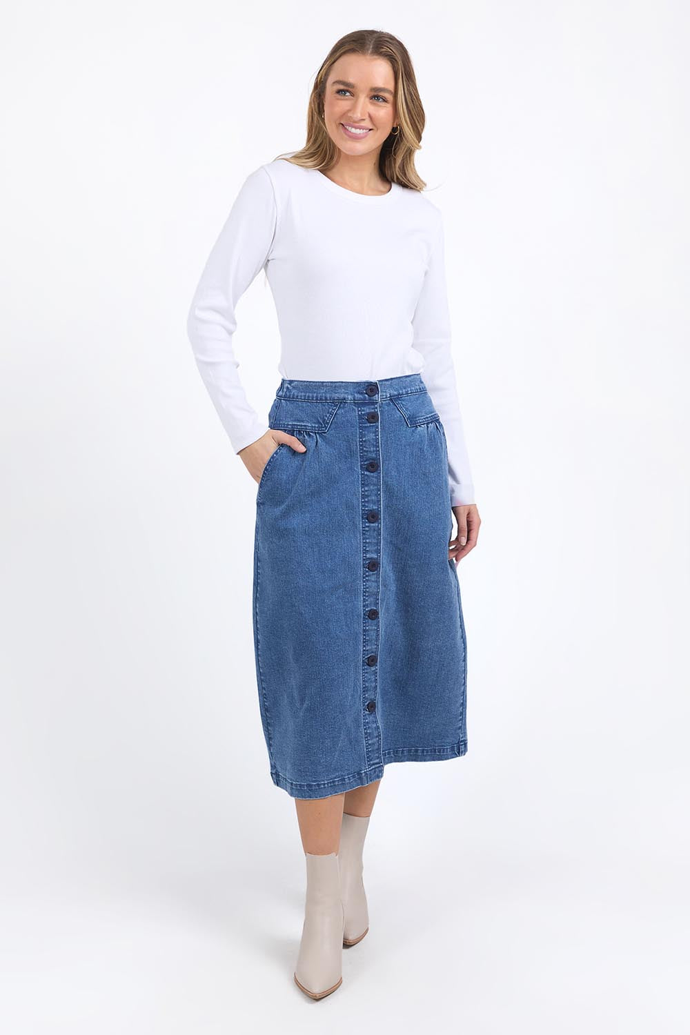 A model wearing the Amanda Cotton Blend Midi Skirt in colour Midblue (Blue), from the front, showing the whole outfit