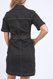 A model wearing the Riva Denim Dress in colour Black (Black), from the back
