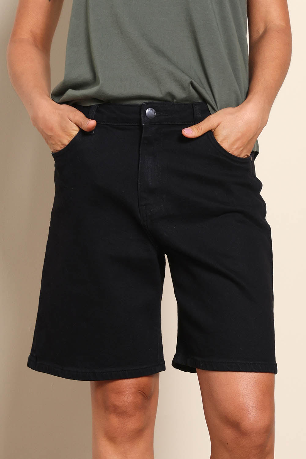 Model Pamelar wearing size 10 of the Elements Harley Denim Short - Black in colour Black, in a cropped view