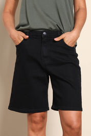 Model Pamelar wearing size 10 of the Elements Harley Denim Short - Black in colour Black, in a cropped view