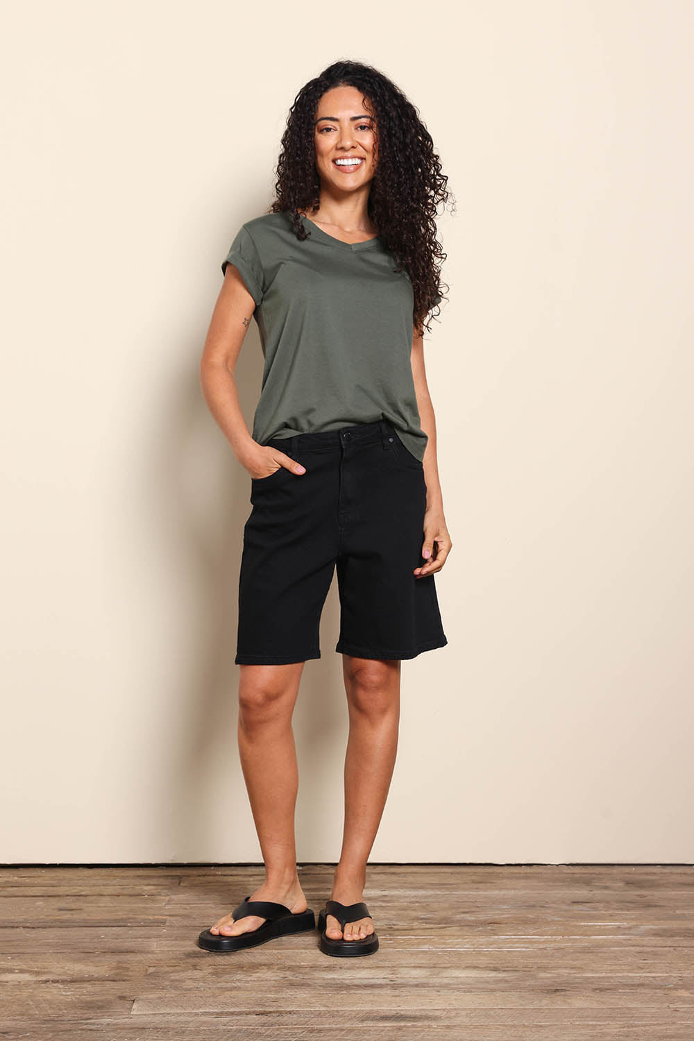 Model Pamelar wearing size 10 of the Elements Harley Denim Short - Black in colour Black, from the front