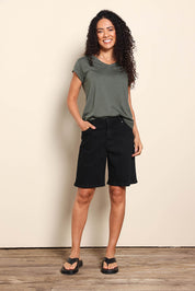 Model Pamelar wearing size 10 of the Elements Harley Denim Short - Black in colour Black, from the front