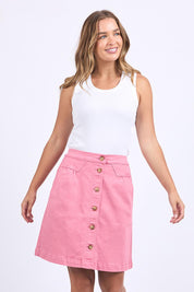 A model wearing the Elements Amanda Skirt in colour Muskpink (Pink), from the front, cropped image
