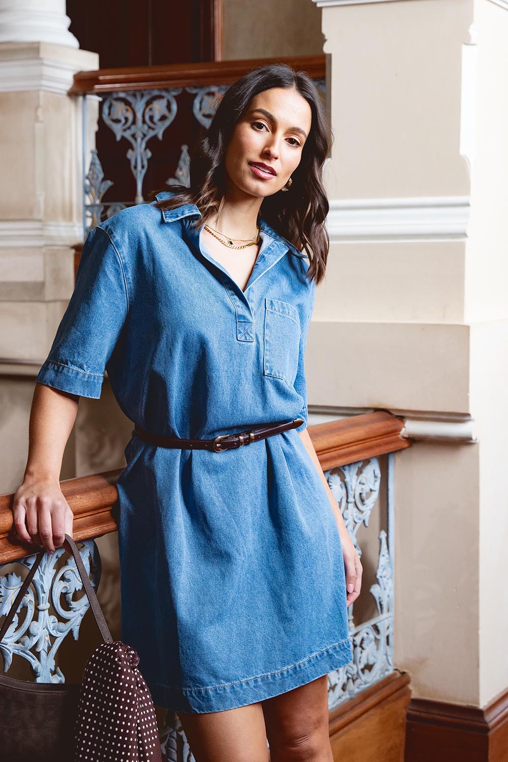 A model wearing the Monte Shirt Dress in colour Midblue (Blue), from the front, showing the whole outfit