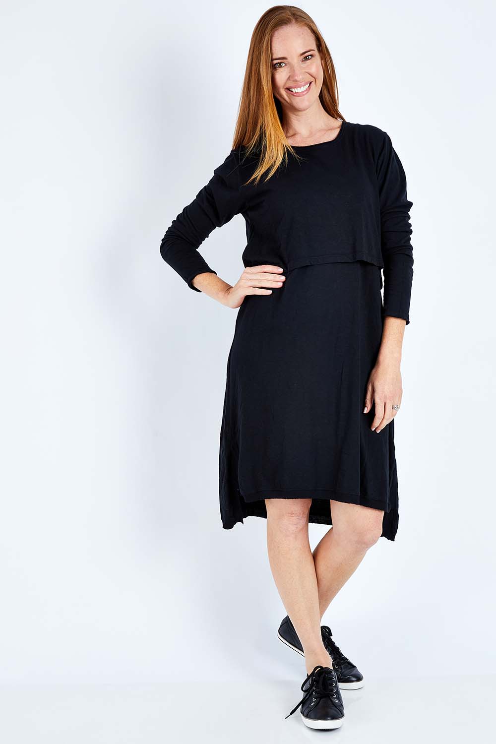 Model Katie wearing size 10 of the Elements Highline Long Sleeve Dress in colour Black (Black), from the front, showing the whole outfit