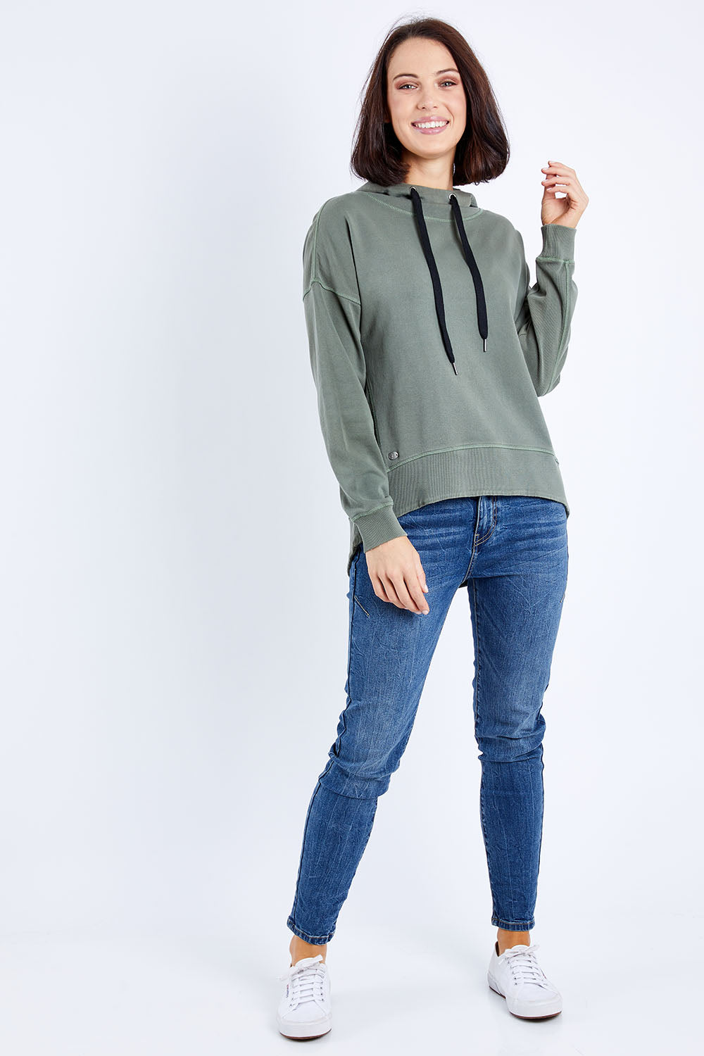 Model Andrea wearing size 10 of the Elements Jasmine Hoodie in colour Khaki (Green), from the front, showing the whole outfit