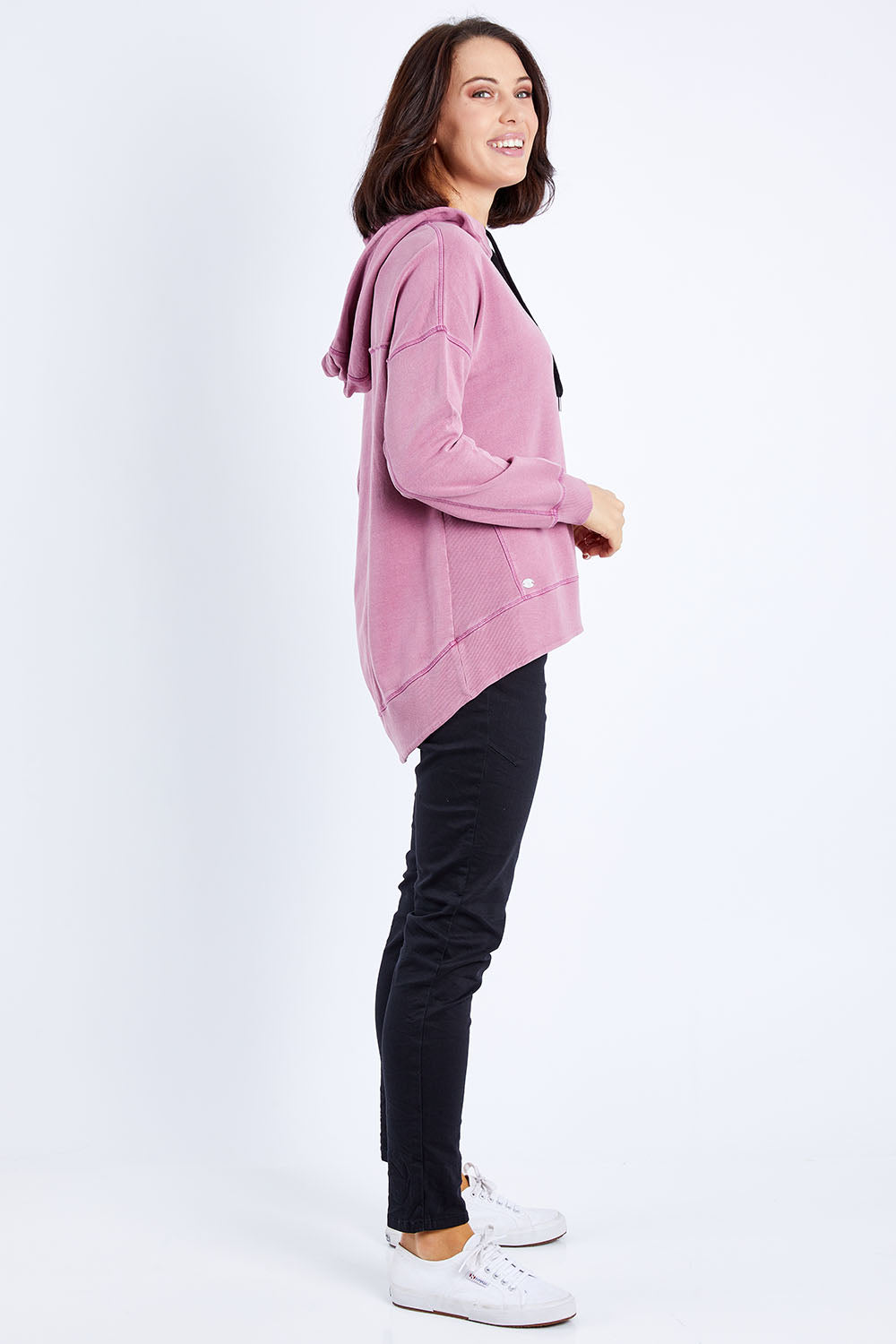 Model Andrea wearing size 10 of the Elements Jasmine Hoodie in colour Rosepink (Pink), from the front, showing the whole outfit