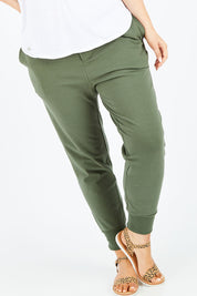 Model Jess wearing size 14 of the Chelsea Pant in colour Khaki (Green), from the front, cropped image