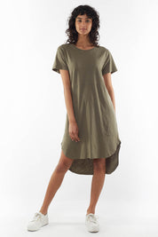 A model wearing the Elements Bayley Dress in colour Khaki (Green), from the front, showing the whole outfit