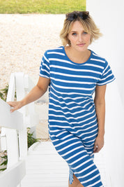 A model wearing the Elements S/S Bouvier Dress in colour Bluewhit (Blue), from the front, showing the whole outfit