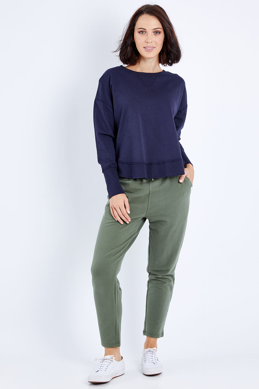 Model Andrea wearing size 10 of the Elements Delilah Crew in colour Navy (Blue), from the front, showing the whole outfit