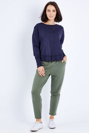 Model Andrea wearing size 10 of the Elements Delilah Crew in colour Navy (Blue), from the front, showing the whole outfit
