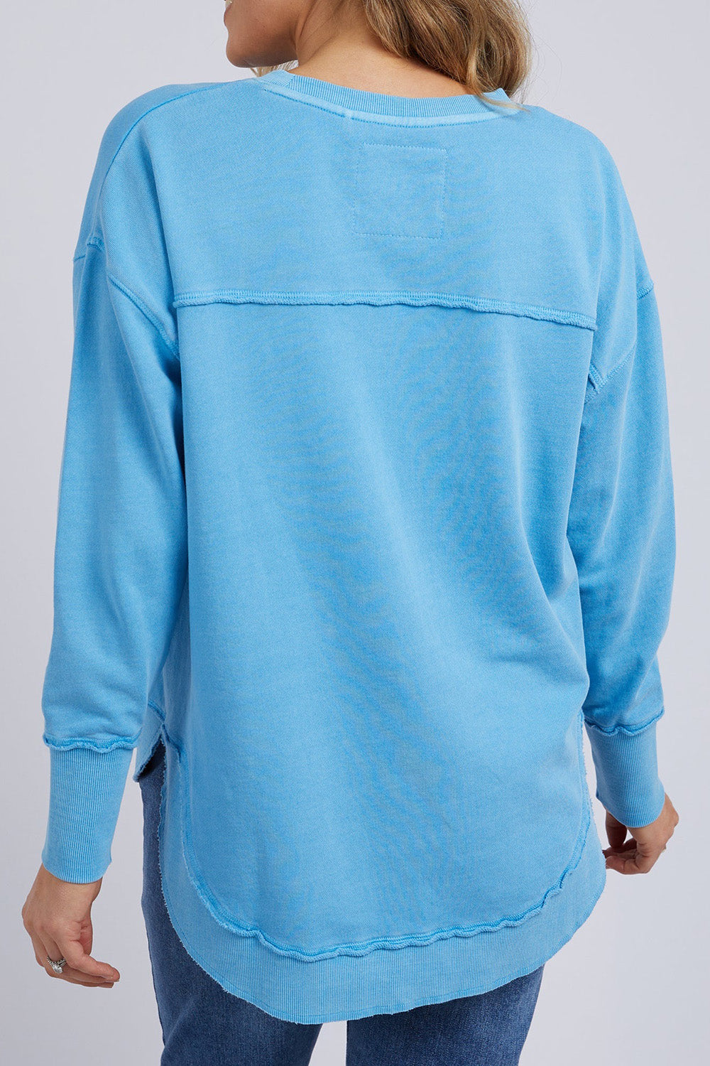 A model wearing the Elements Simplified Cotton Crew in colour BrightBlue (Blue), from the back