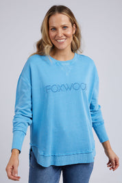 A model wearing the Elements Simplified Cotton Crew in colour BrightBlue (Blue), from the front, cropped image