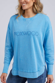 A model wearing the Elements Simplified Cotton Crew in colour BrightBlue (Blue), from the front, cropped image
