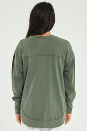 Model Katie wearing size 10 of the Elements Washed Simplified Crew in colour Khaki (Green), from the back