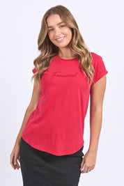 A model wearing the Elements Signature Cotton Tee in colour Crimson (Red), from the front, cropped image