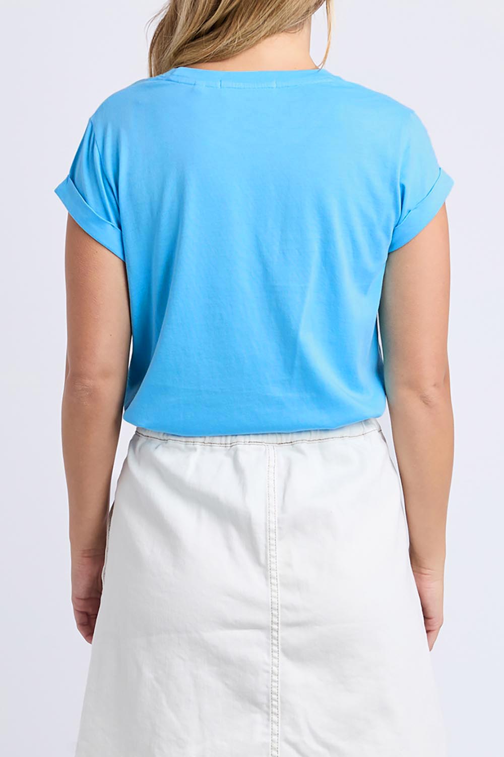 A model wearing the Elements Manly Cotton Tee in colour Azure (Blue), from the back