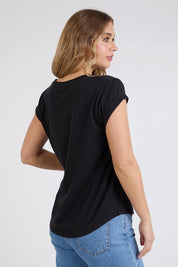 A model wearing the Elements Manly Cotton Tee in colour Black (Black), from the back