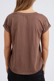 A model wearing the Elements Manly Cotton Tee in colour Chocolate, from the back