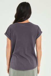 Model Katie wearing size 10 of the Elements Manly Cotton Tee in colour Coal (Black), from the back
