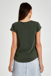 Model Madeline wearing size 10 of the Elements Manly Cotton Tee in colour Khaki (Green), from the back