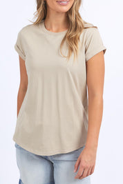 A model wearing the Elements Manly Cotton Tee in colour Oatmeal, from the front, cropped image