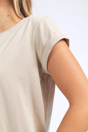 A model wearing the Elements Manly Cotton Tee in colour Oatmeal, from the front, cropped image