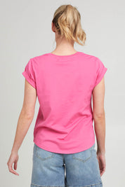 Model Grace wearing size 10 of the Elements Manly Cotton Tee in colour Pinkpunch (Pink), from the back